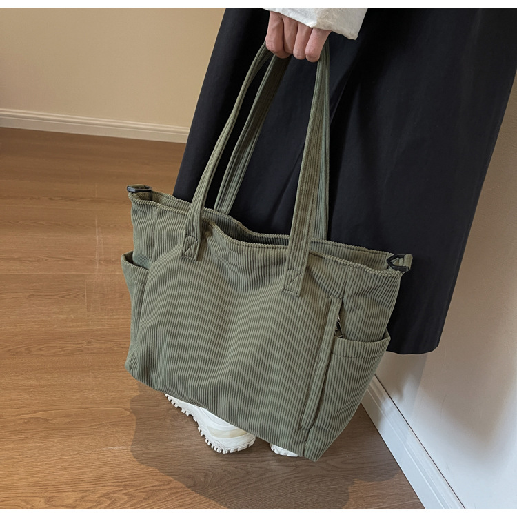 Large Capacity Art Student Shoulder Bag. Product information: Lining texture: Polyester, Applicable scenario: leisure travel, Color: creamy-white, green, black, Outer bag type: Sandwich pocket, Hardness: medium and soft, Material: corduroy, Suitcase shape