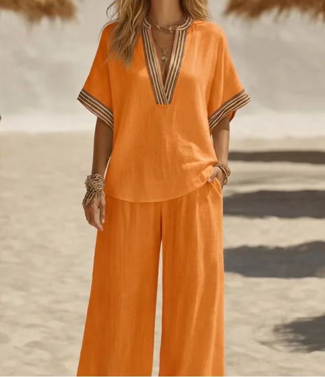 Women's sleeveless linen two-piece set in Yellow – wide-leg pants and cardigan top styled for summer evening