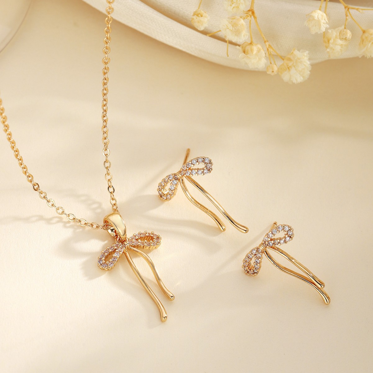 Copper Inlaid Zircon Bow Pendant Earrings Two-Piece Set