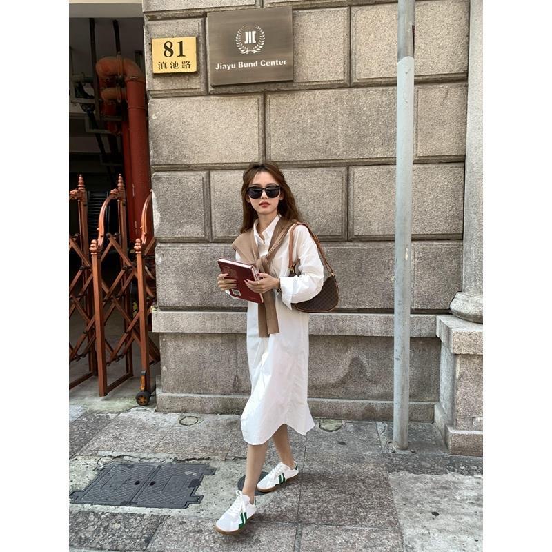 A Warm And Cozy Wool Shawl Or A Lightweight Cardigan That Can Be Layered