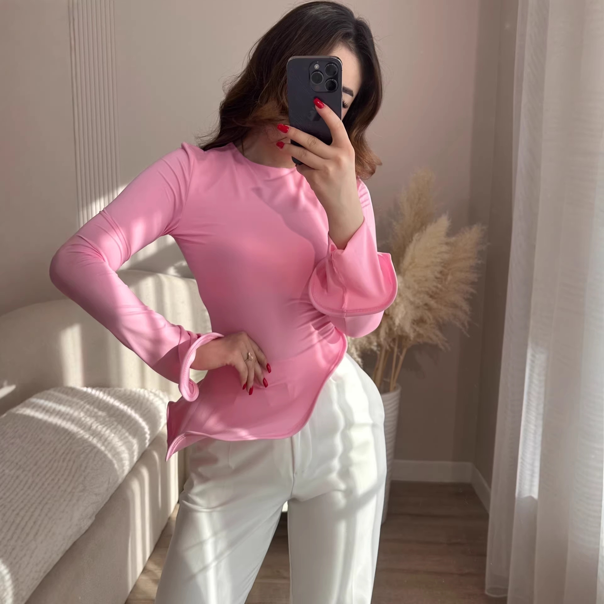 Crew-neck T-shirt With A Solid Color And An Asymmetrical Ruffled Hem