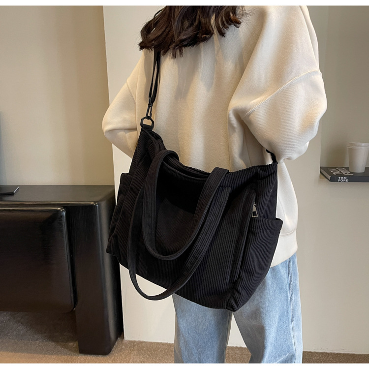 Large Capacity Art Student Shoulder Bag. Product information: Lining texture: Polyester, Applicable scenario: leisure travel, Color: creamy-white, green, black, Outer bag type: Sandwich pocket, Hardness: medium and soft, Material: corduroy, Suitcase shape