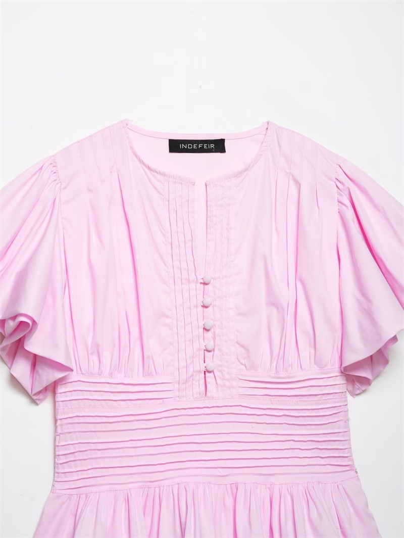 Women's ruffle-trim blouse in pink – slim-fit sleeveless puff-sleeve elegant top