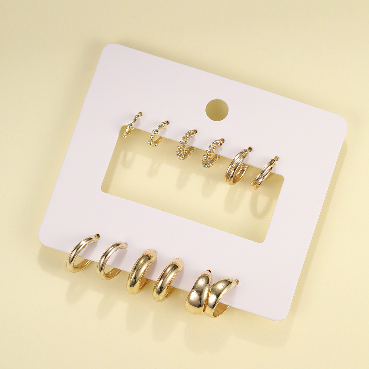 Creative Fashionable Golden Twist Earrings Suit
