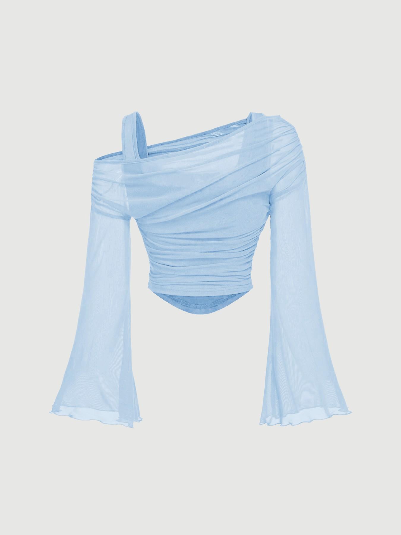 Women's knit top – blue colorway styled with jeans for everyday casual