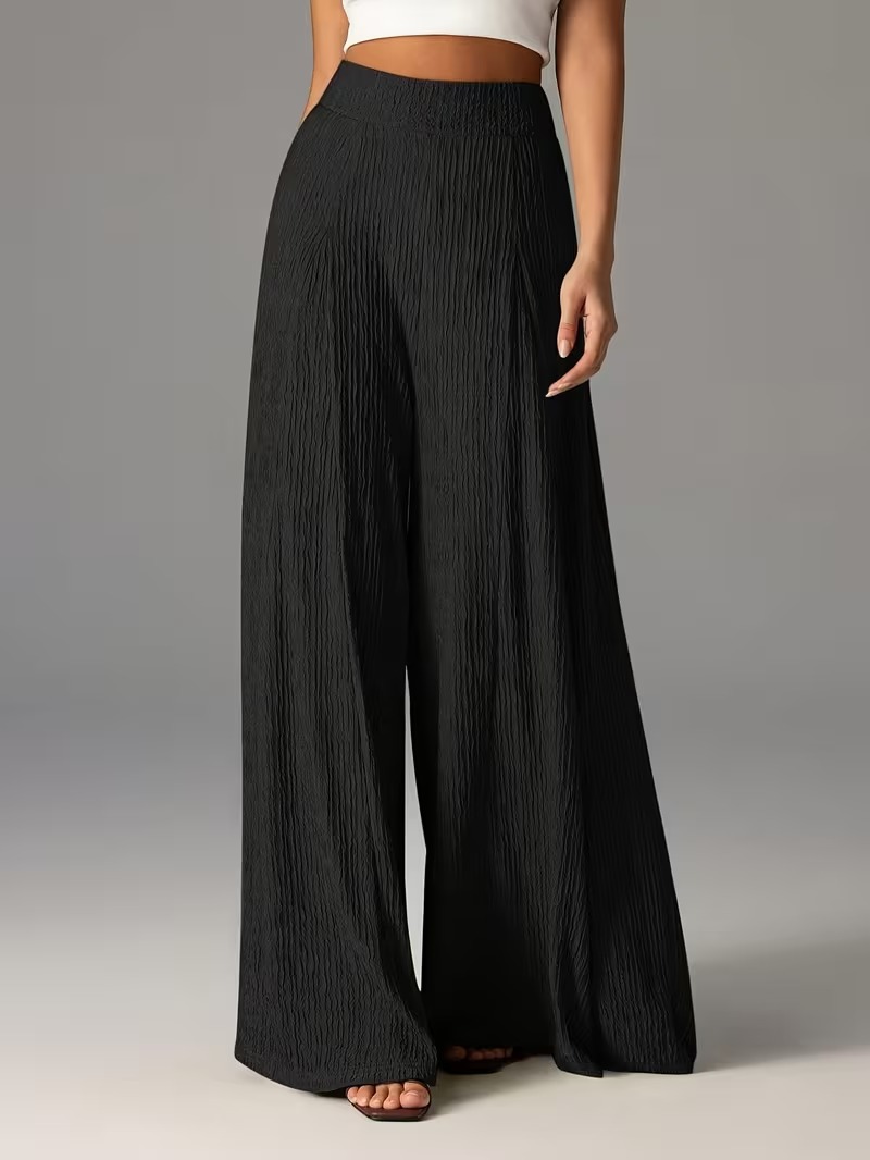 Pantalones holgados de color liso con cintura elástica y talle alto. B9a8d969 Ed7f 49cb 86a7 0704fb86f14f