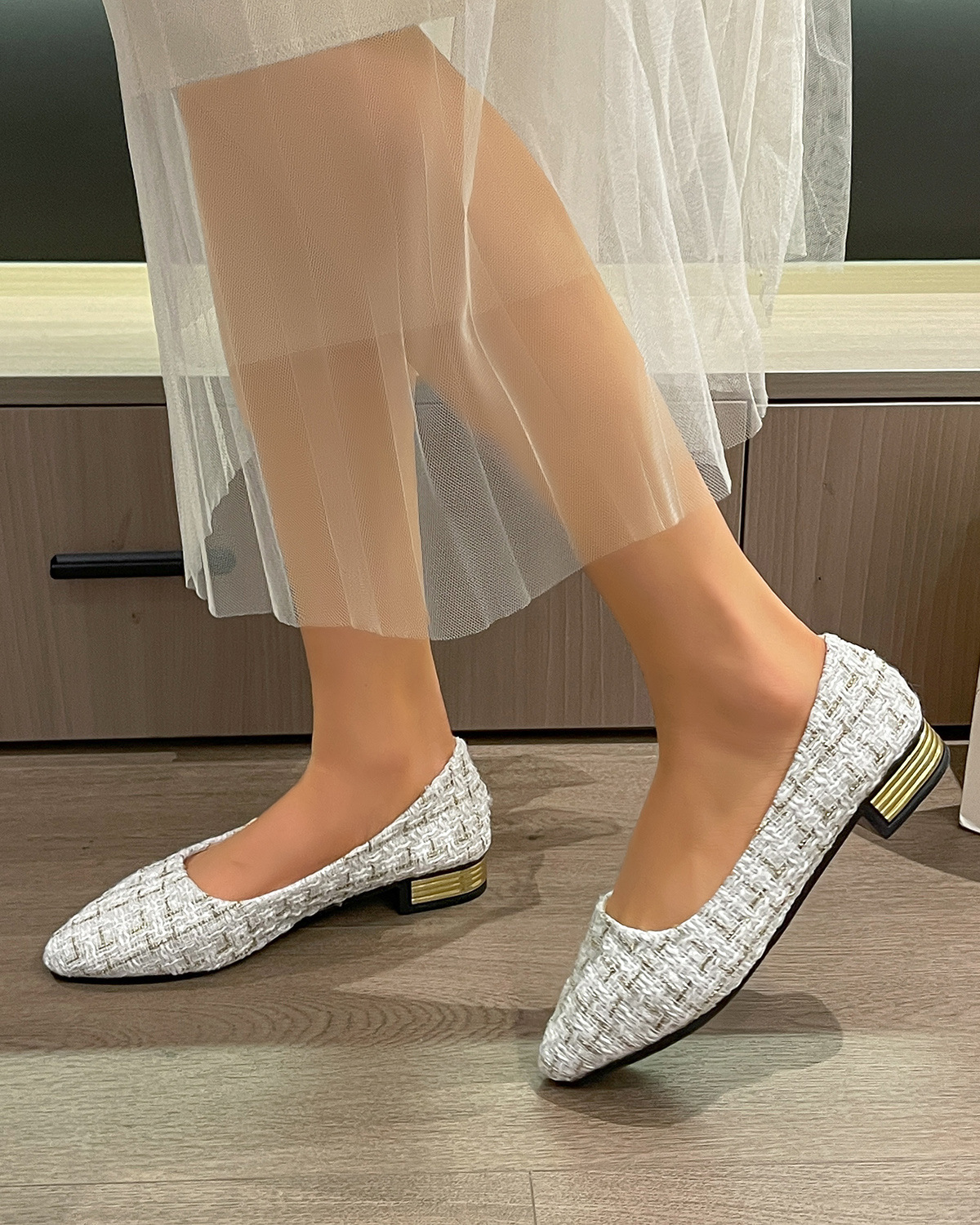 Slip-On Pumps worn on feet in Beige – lifestyle shot