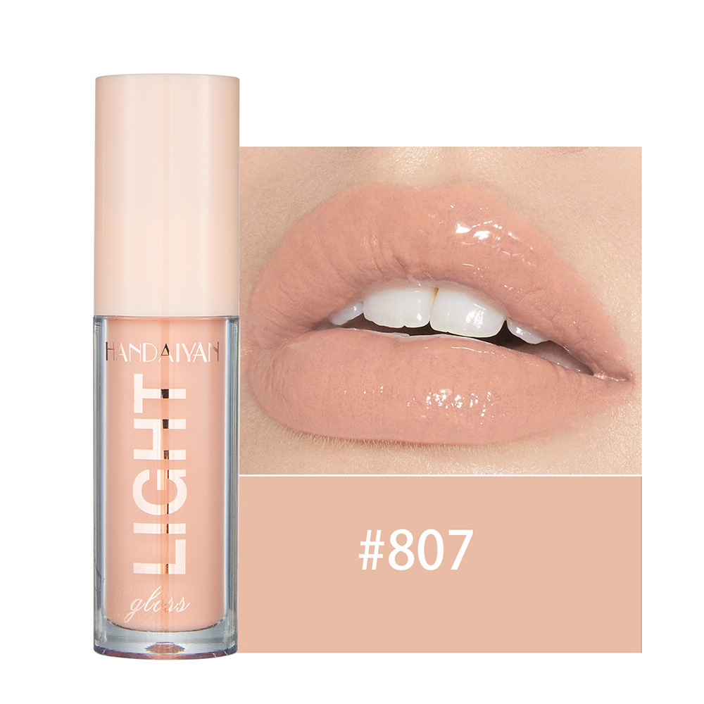 Mirror-like Dewy Liquid With A Pearly Sheen For The Lips