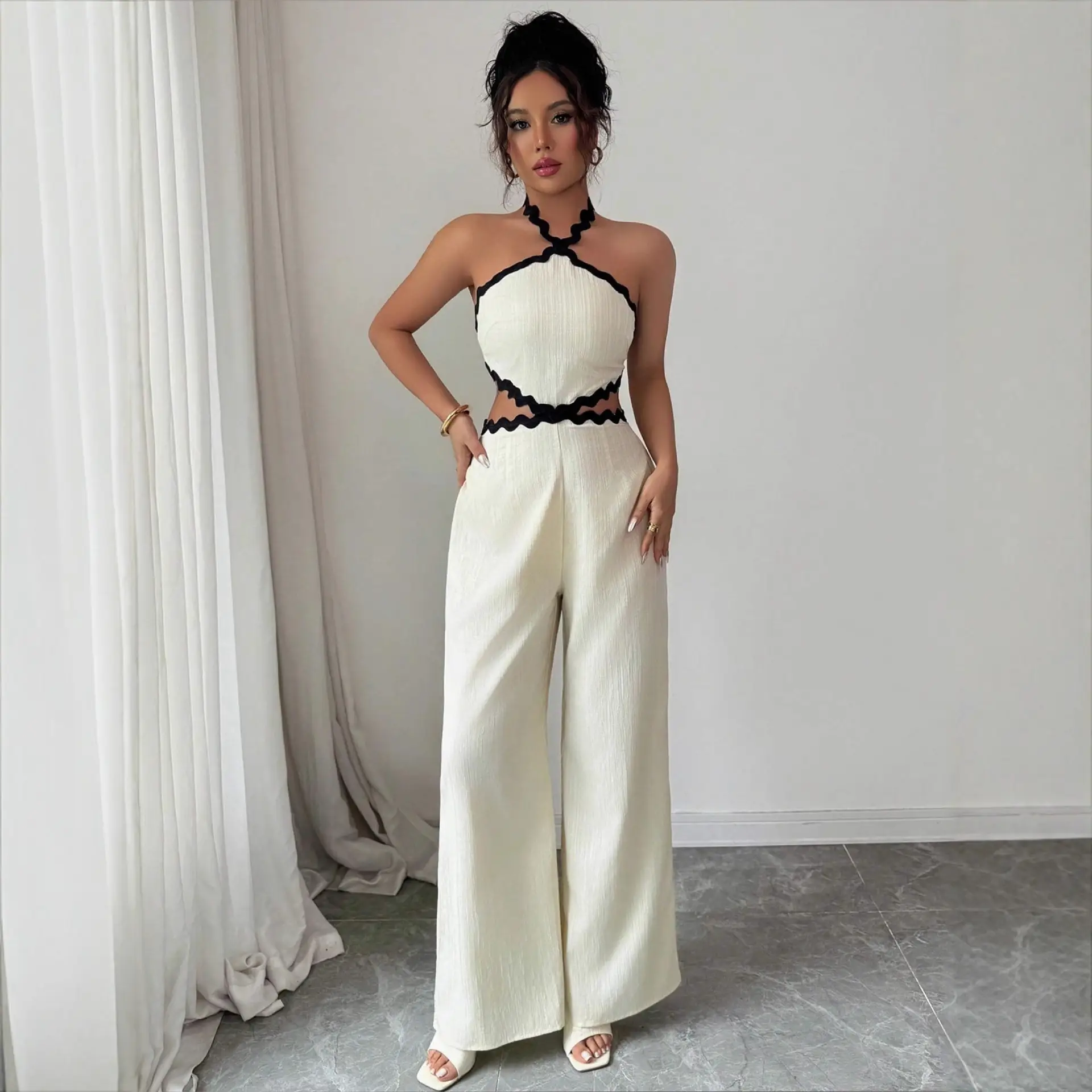 Women's Fashionable Wave Lace Texture Halter Stitching Hollow-out Jumpsuit