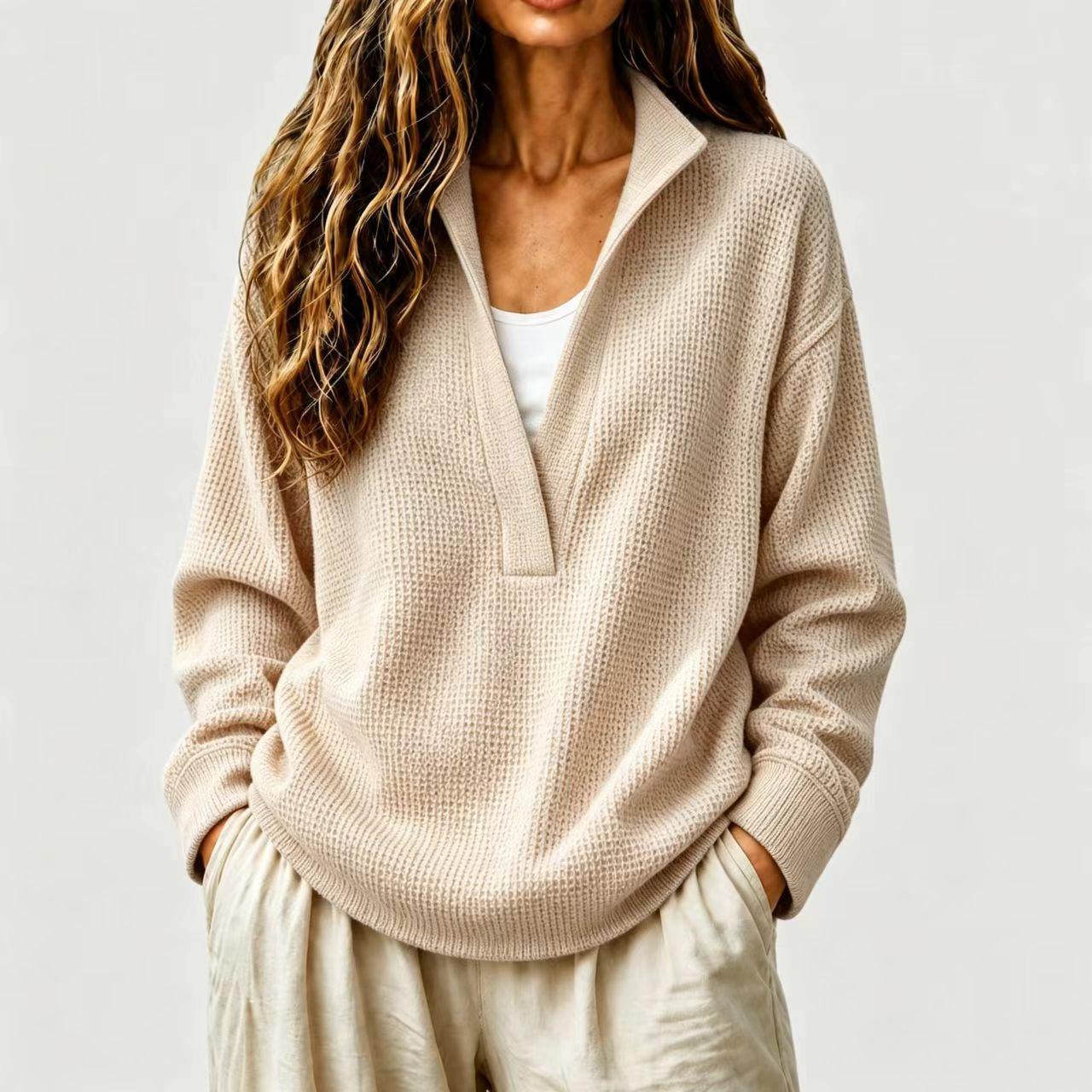 Women's waffle-knit oversized pullover – styled on model showing full outfit and open V-collar detail