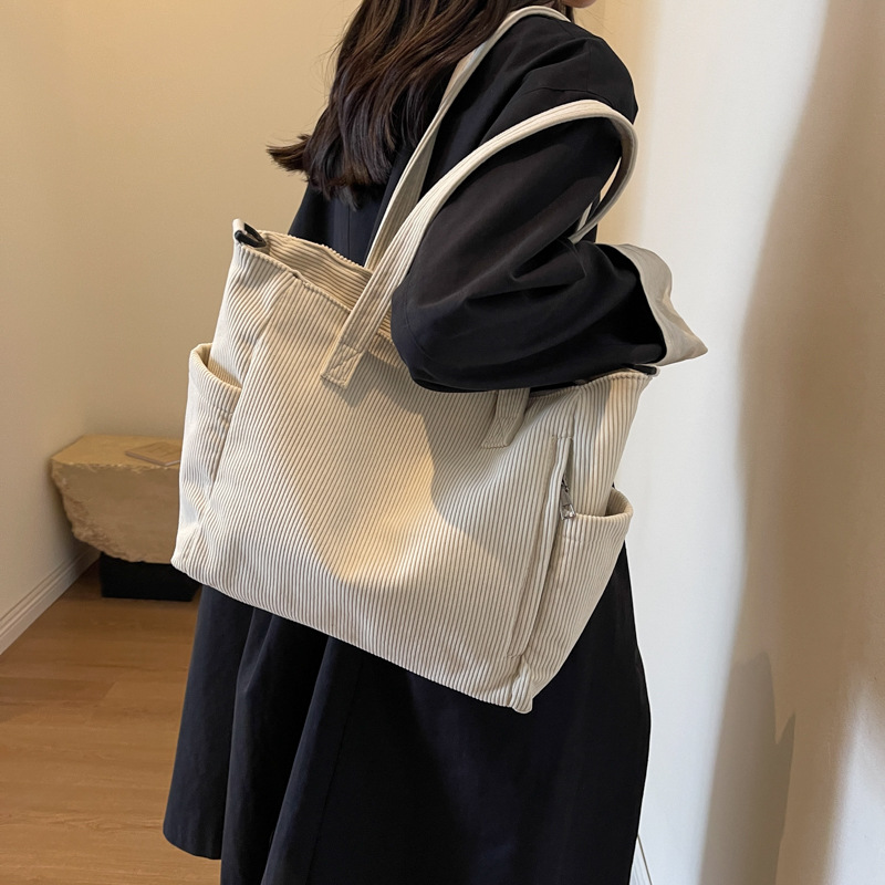 Large Capacity Art Student Shoulder Bag. Product information: Lining texture: Polyester, Applicable scenario: leisure travel, Color: creamy-white, green, black, Outer bag type: Sandwich pocket, Hardness: medium and soft, Material: corduroy, Suitcase shape