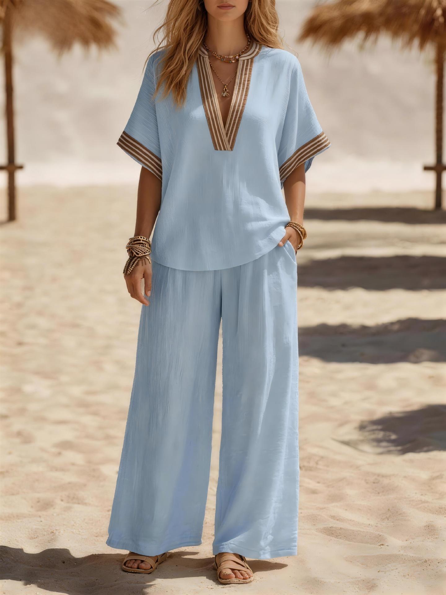 Women's sleeveless linen two-piece set in Pink – wide-leg pants and cardigan top co-ord, lifestyle styling