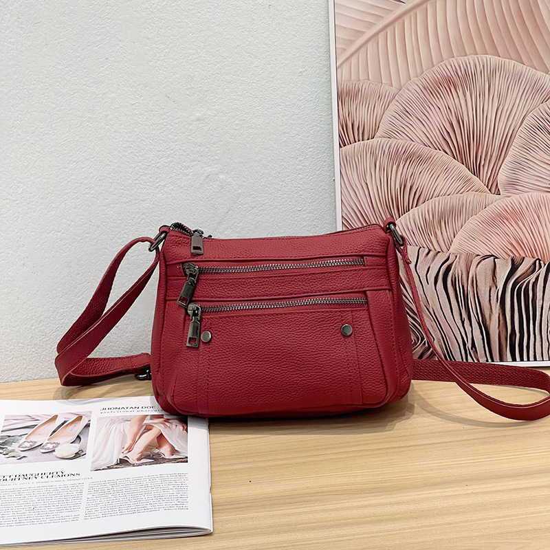 Cowhide Handbag With Crossbody Strap Made Of Genuine Leather