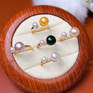 Freshwater Pearl Ring Featuring A Mix Of Large And Small Pearls In A Variety Of Colors