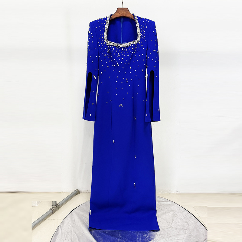 Fashionable Heavily Embellished Beaded Long Dress With A Slit Sleeve And Square Neckline