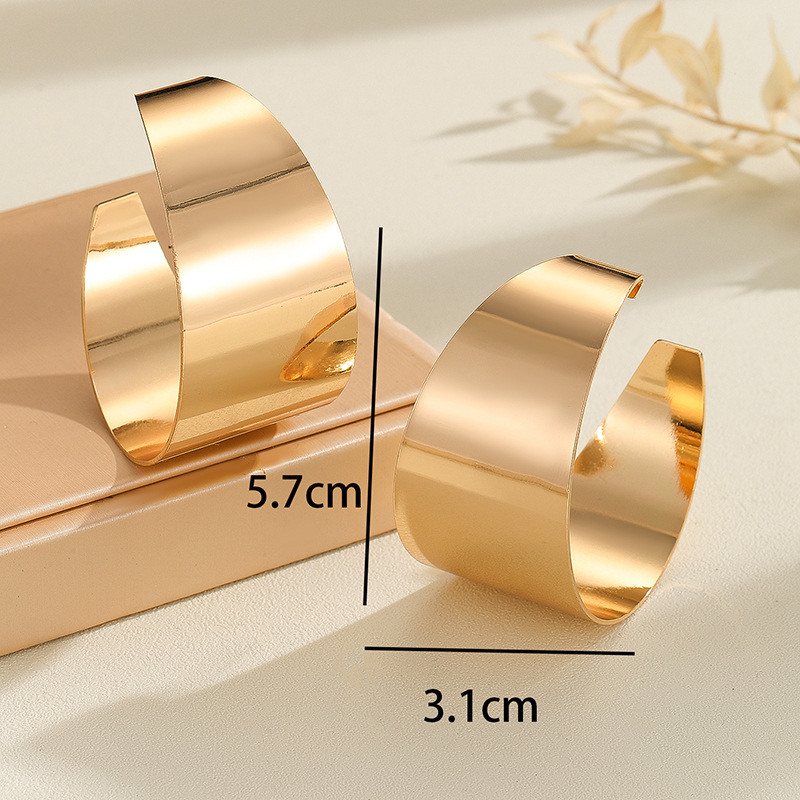 Simple High-grade Golden Glossy C- Shaped Earrings