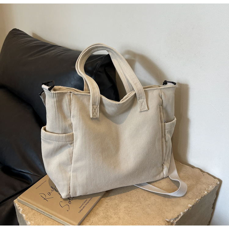 Large Capacity Art Student Shoulder Bag. Product information: Lining texture: Polyester, Applicable scenario: leisure travel, Color: creamy-white, green, black, Outer bag type: Sandwich pocket, Hardness: medium and soft, Material: corduroy, Suitcase shape