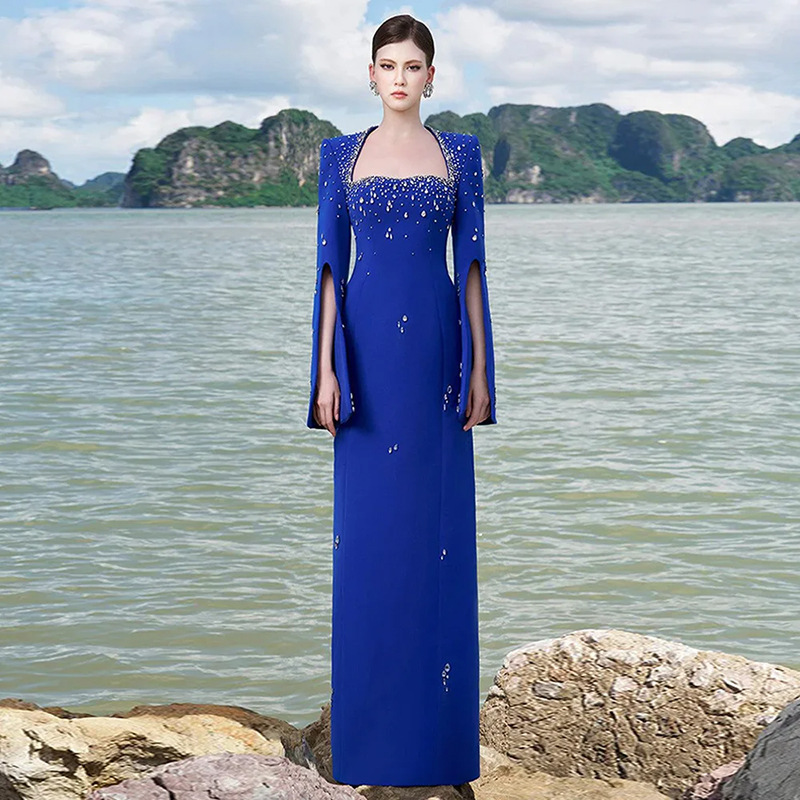 Fashionable Heavily Embellished Beaded Long Dress With A Slit Sleeve And Square Neckline
