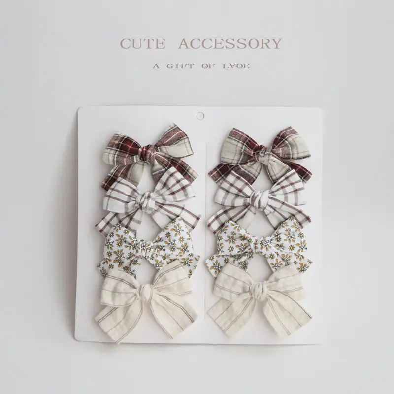 Dovetail Bow Around A Pair Of Hairclips 1 Group
