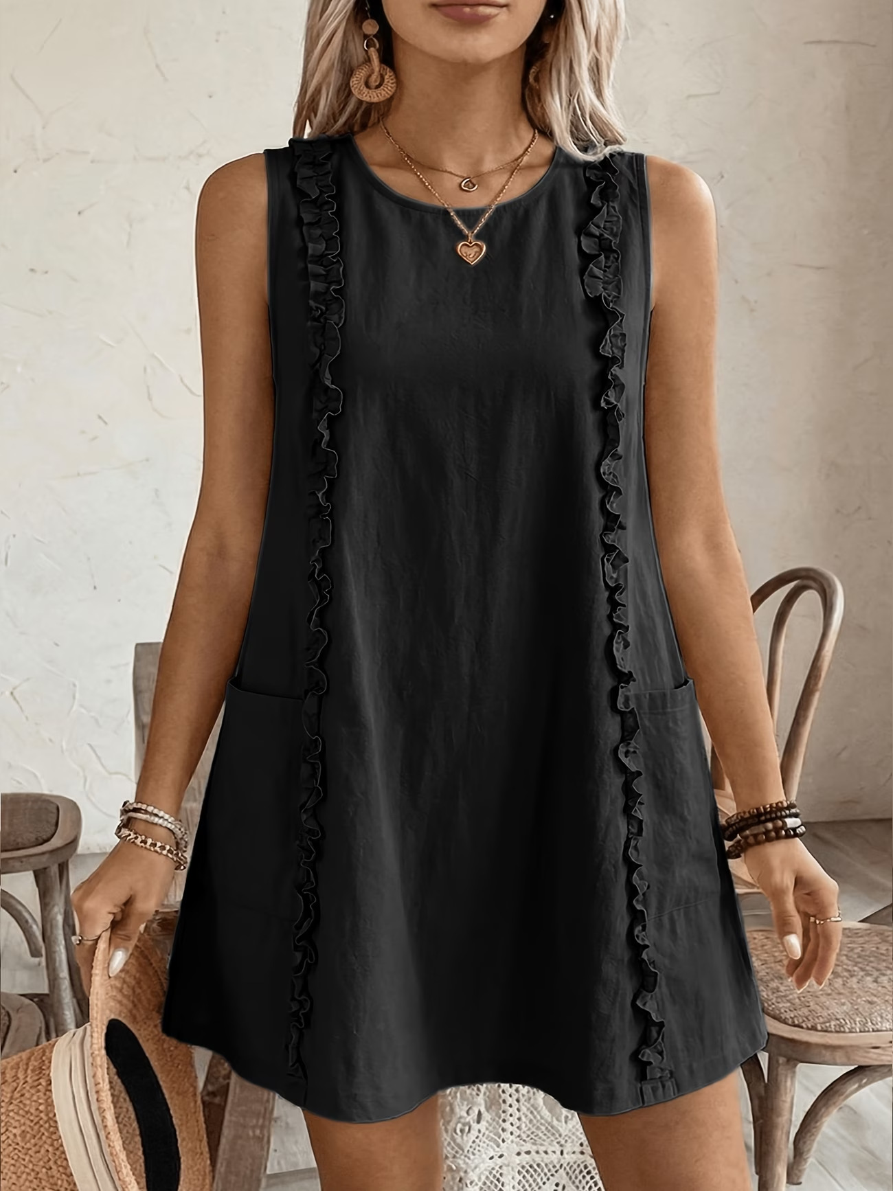 Women's solid ruffle dress in black – front view