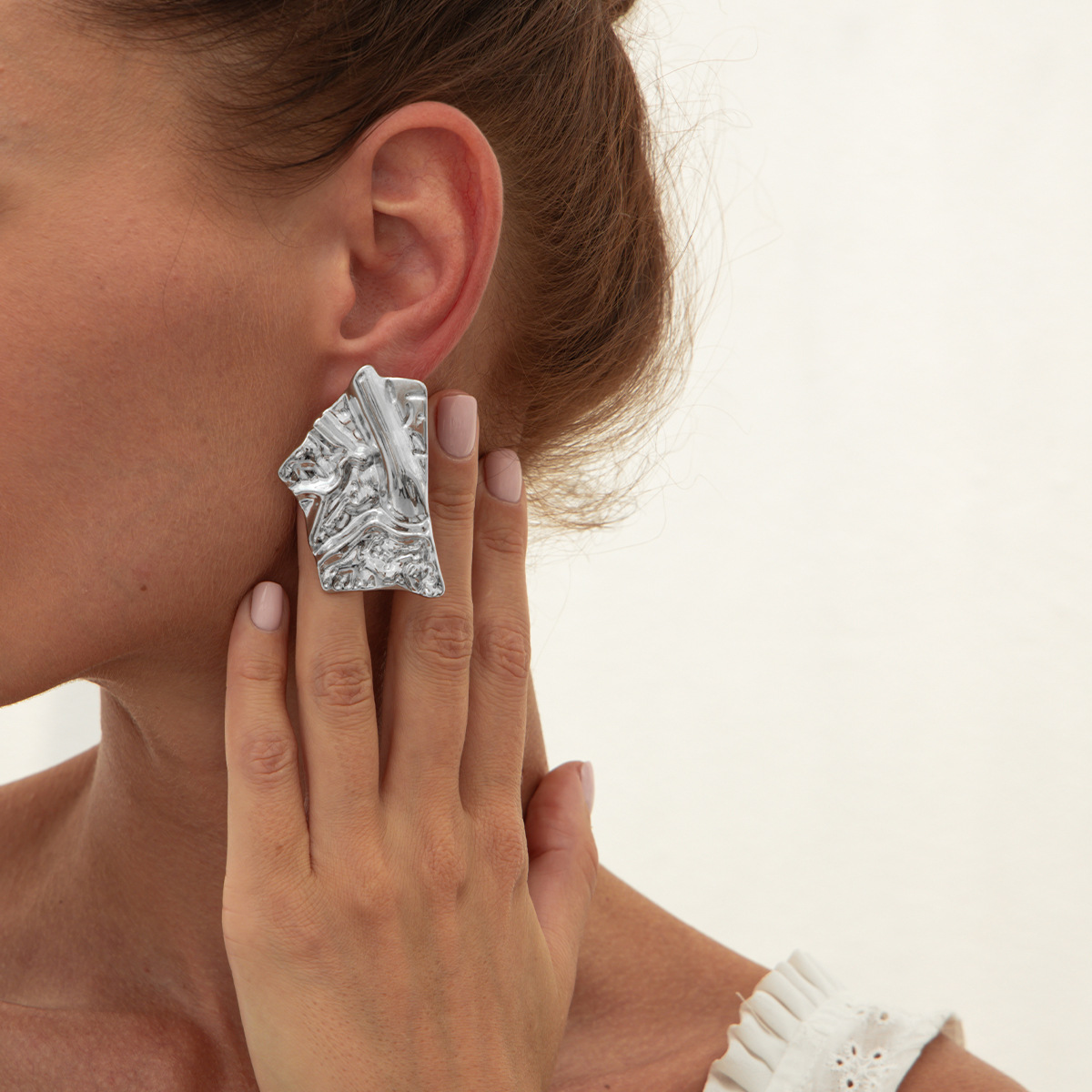 White K Stud Earrings