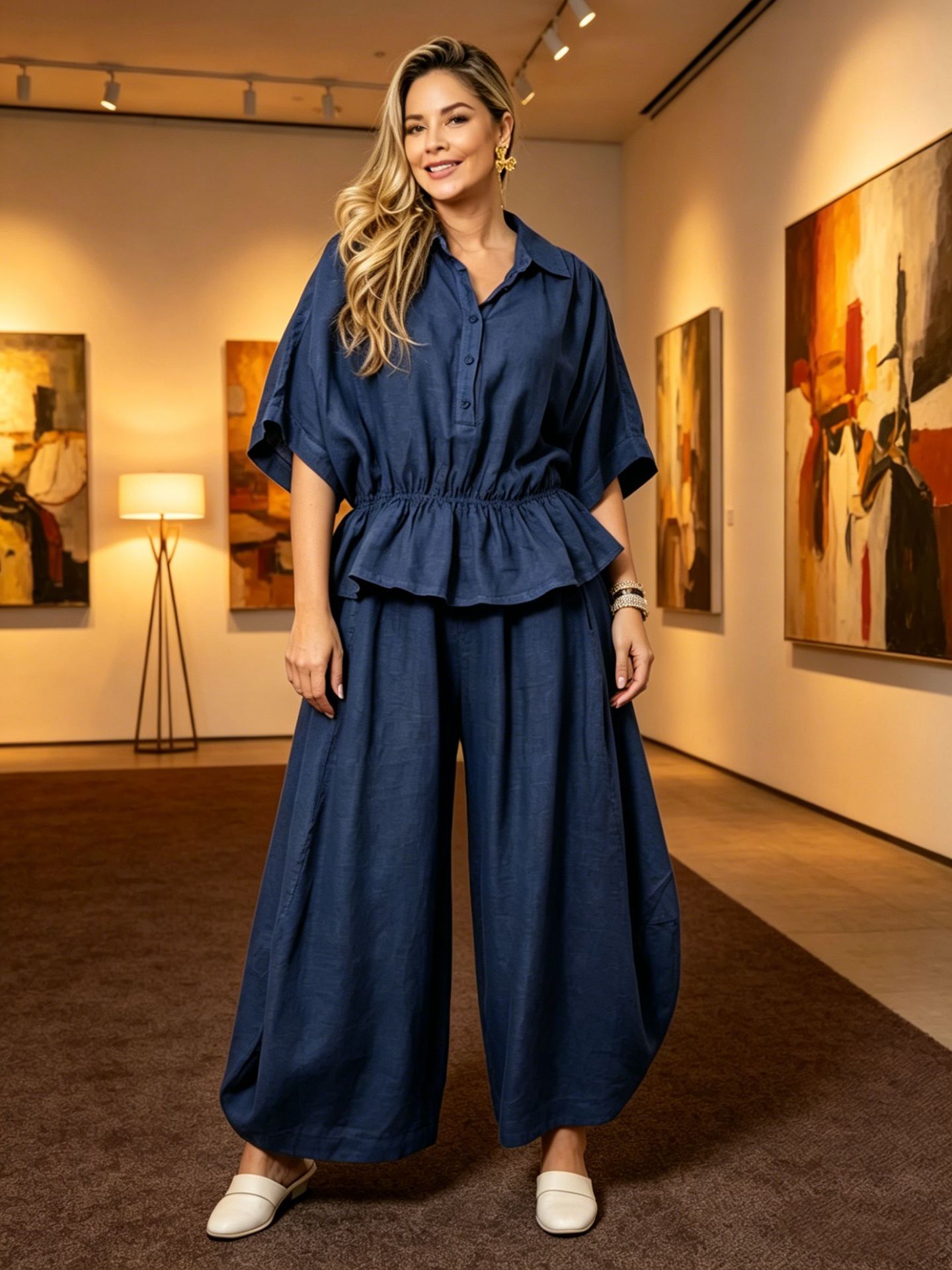 Women's plus size belted shirt and wide-leg pants set in navy blue – front view