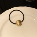Gold Oval Ball Rubber Band