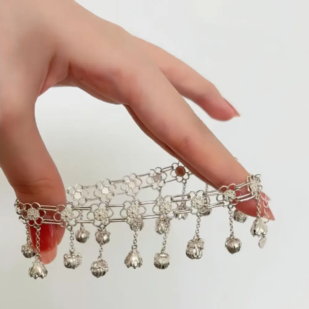 Silver Openwork Flower Tassel Bracelet