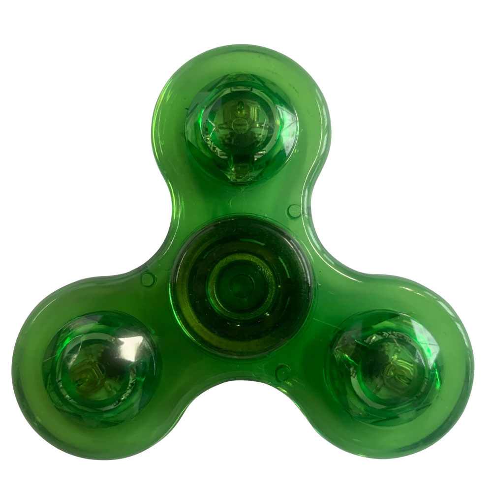 Rotating fingertip gyroscope glowing plastic (transparent