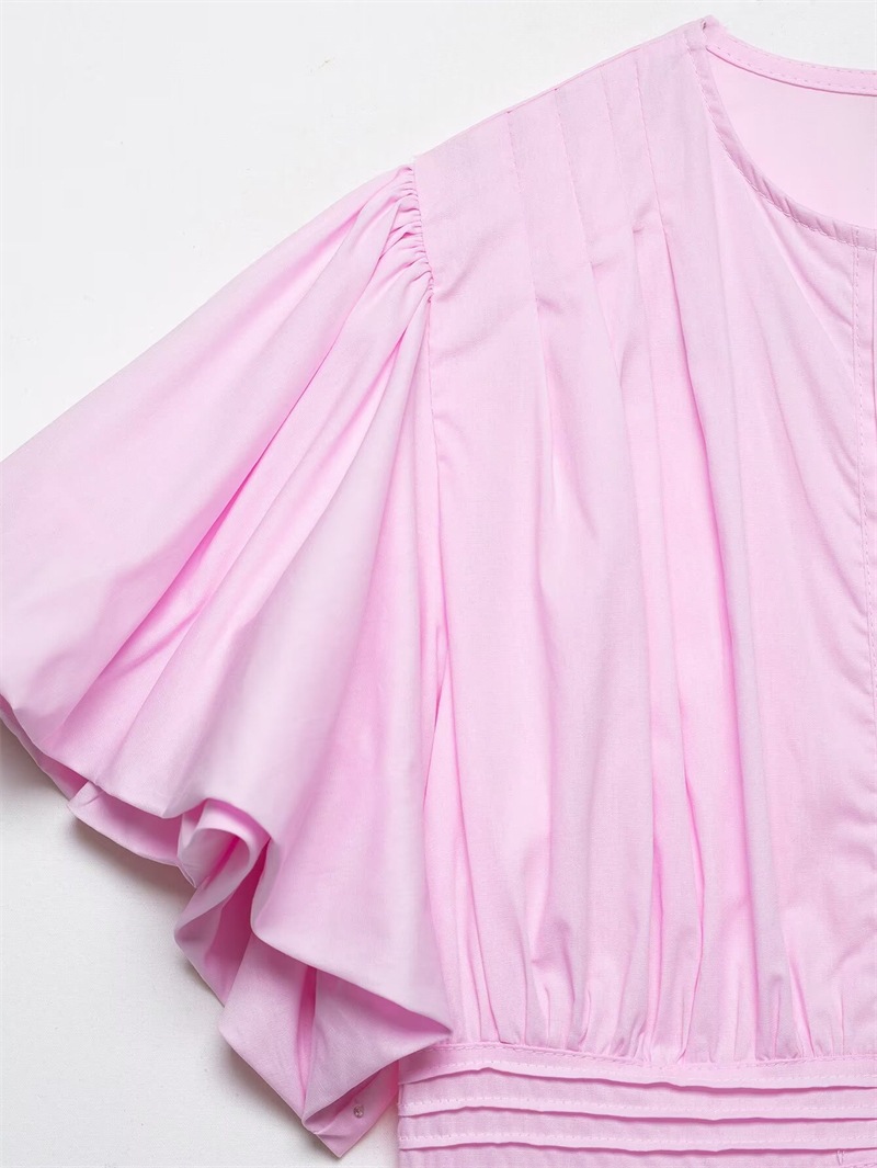 Women's ruffle-trim blouse in pink – slim-fit sleeveless puff-sleeve elegant pullover