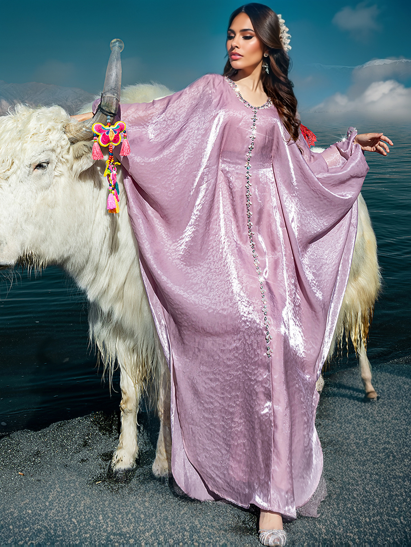 Batwing sleeve cloak with streamers - side view showing flowing design