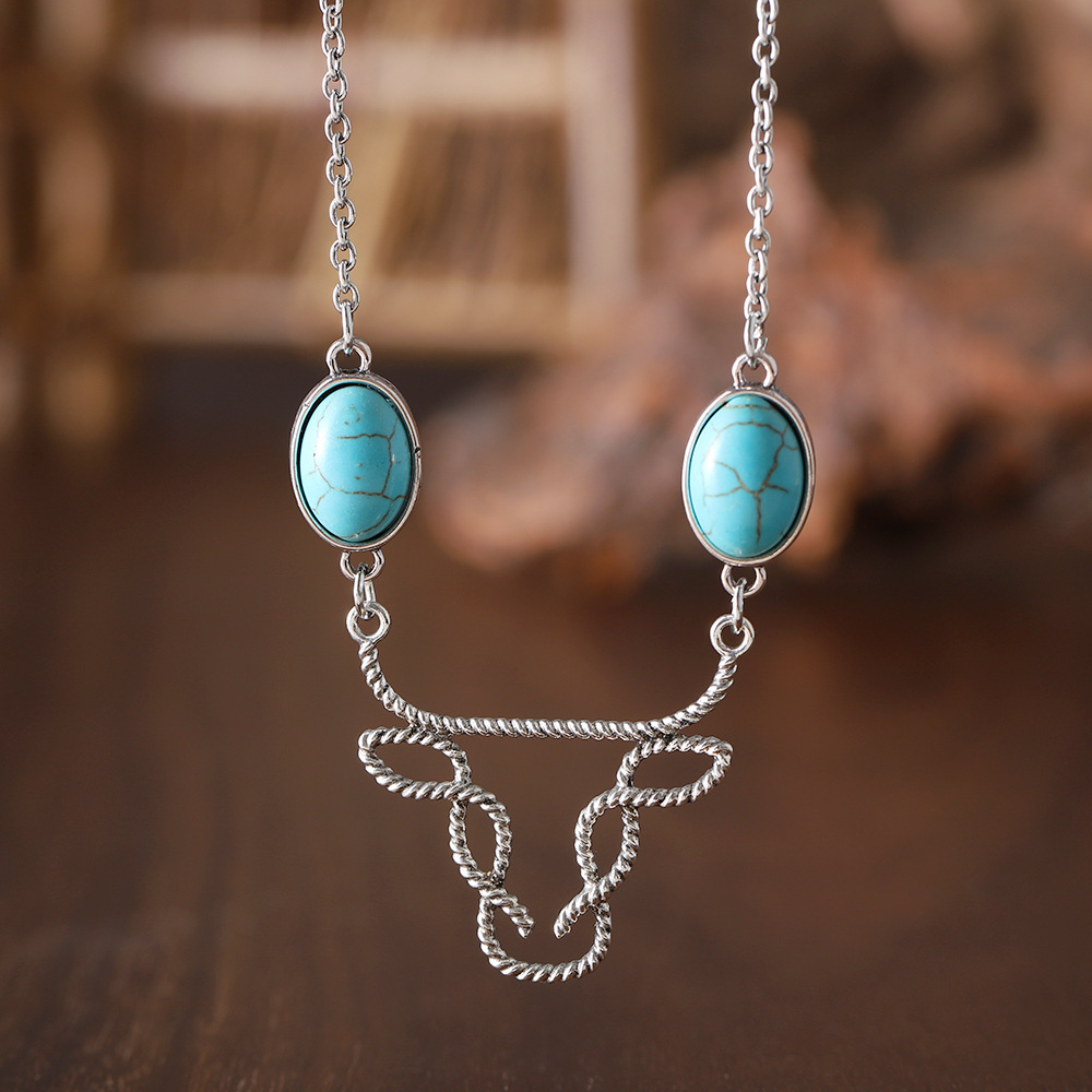 Inlaid Turquoise Cow Head Necklace Hollow Line