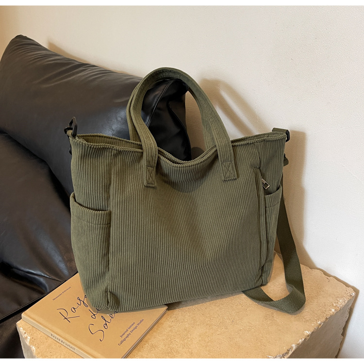 Large Capacity Art Student Shoulder Bag. Product information: Lining texture: Polyester, Applicable scenario: leisure travel, Color: creamy-white, green, black, Outer bag type: Sandwich pocket, Hardness: medium and soft, Material: corduroy, Suitcase shape