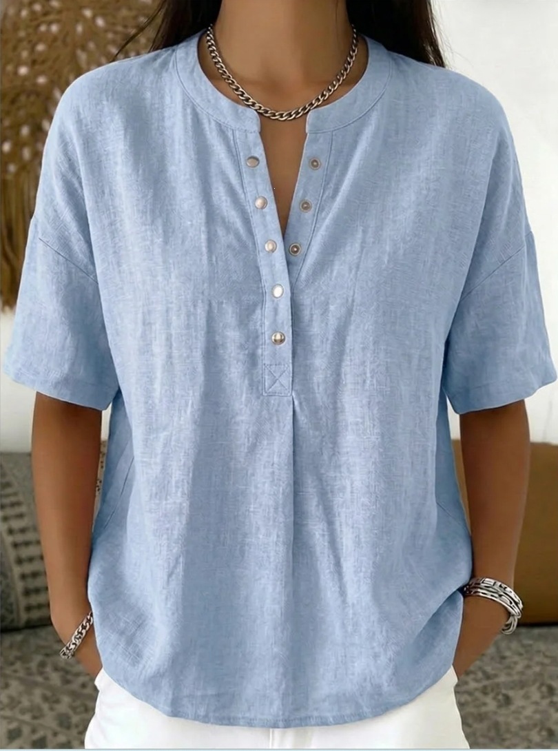 Women's loose-fit pullover top in light blue, full front view showing casual fit