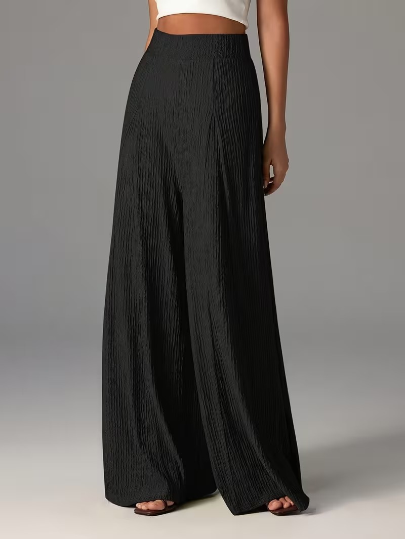 Pantalones holgados de color liso con cintura elástica y talle alto. D272f527 5e47 4ae9 B990 99221234c1dc