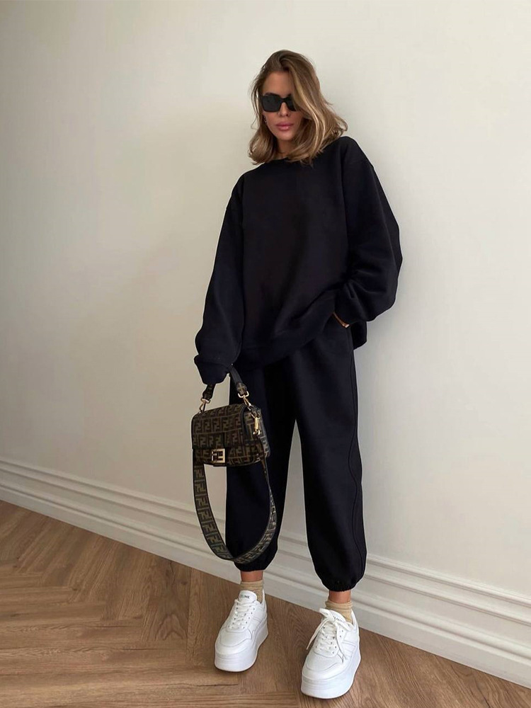 Women's crewneck sweatshirt set in white – styled view