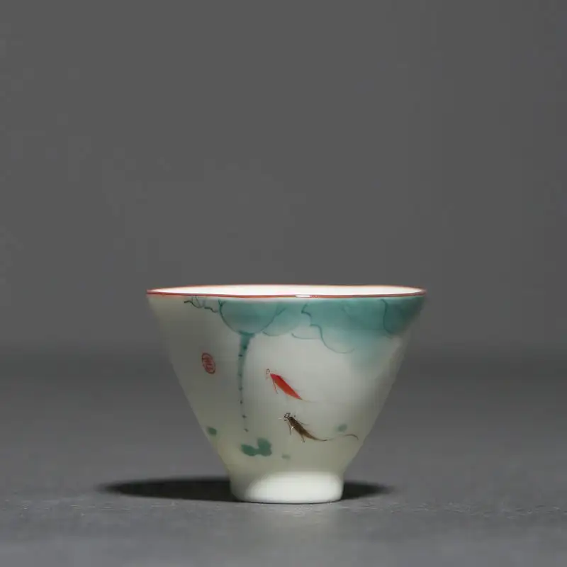 Hand Painted Fish Play Underglaze Porcelain Tea Cup