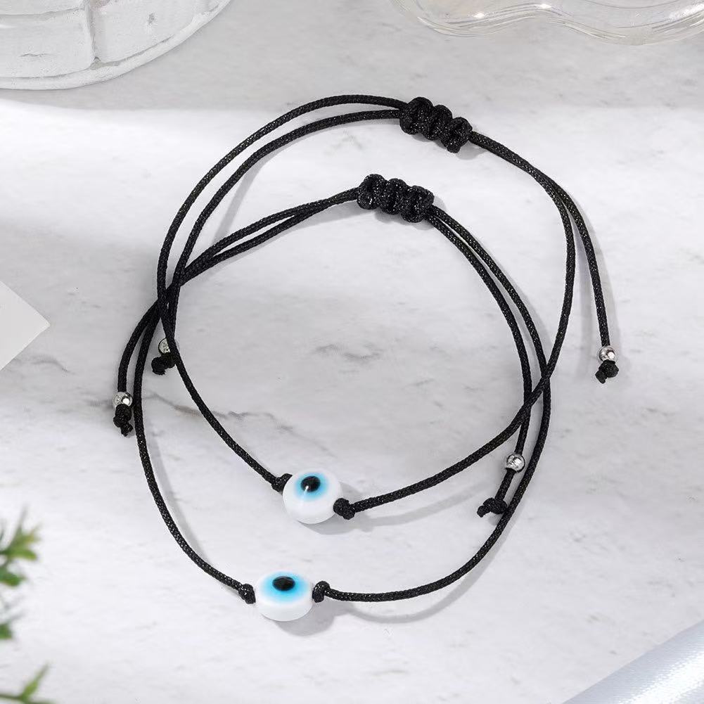 Simple Red Rope Bracelet With A Woven Evil Eye Design
