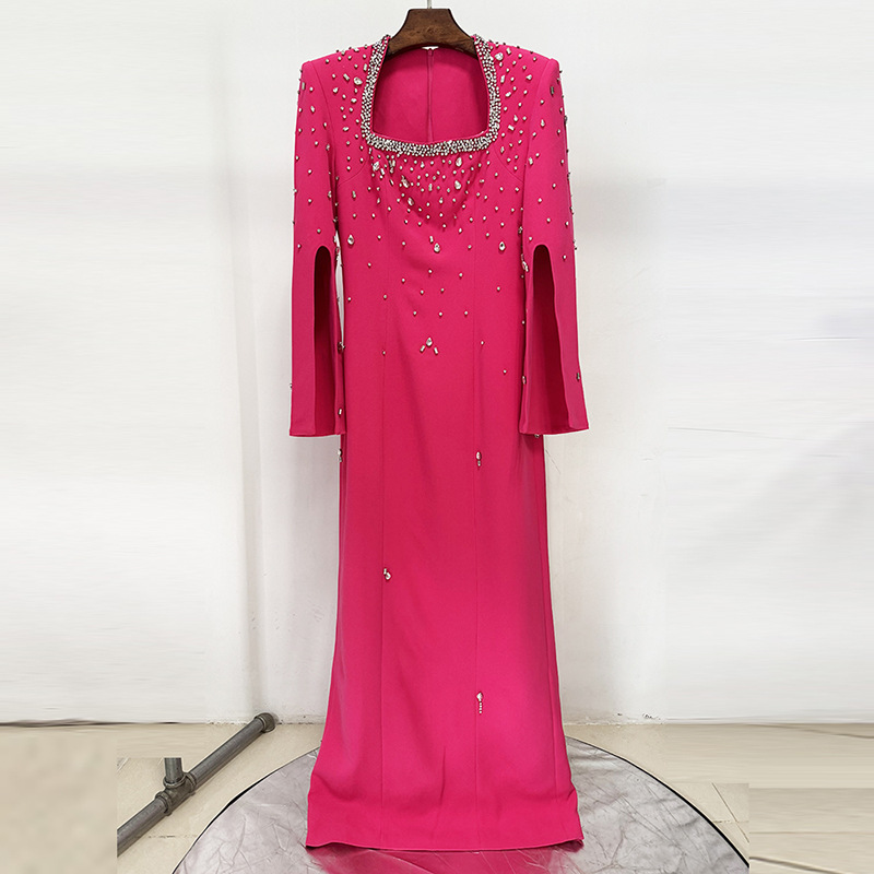 Fashionable Heavily Embellished Beaded Long Dress With A Slit Sleeve And Square Neckline