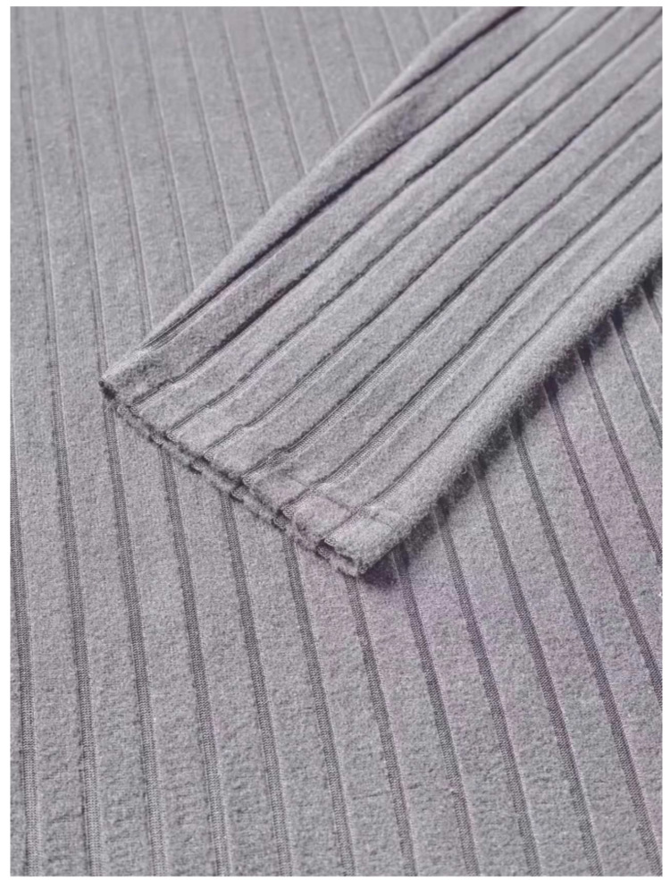 Men's ribbed V-neck sweater detail