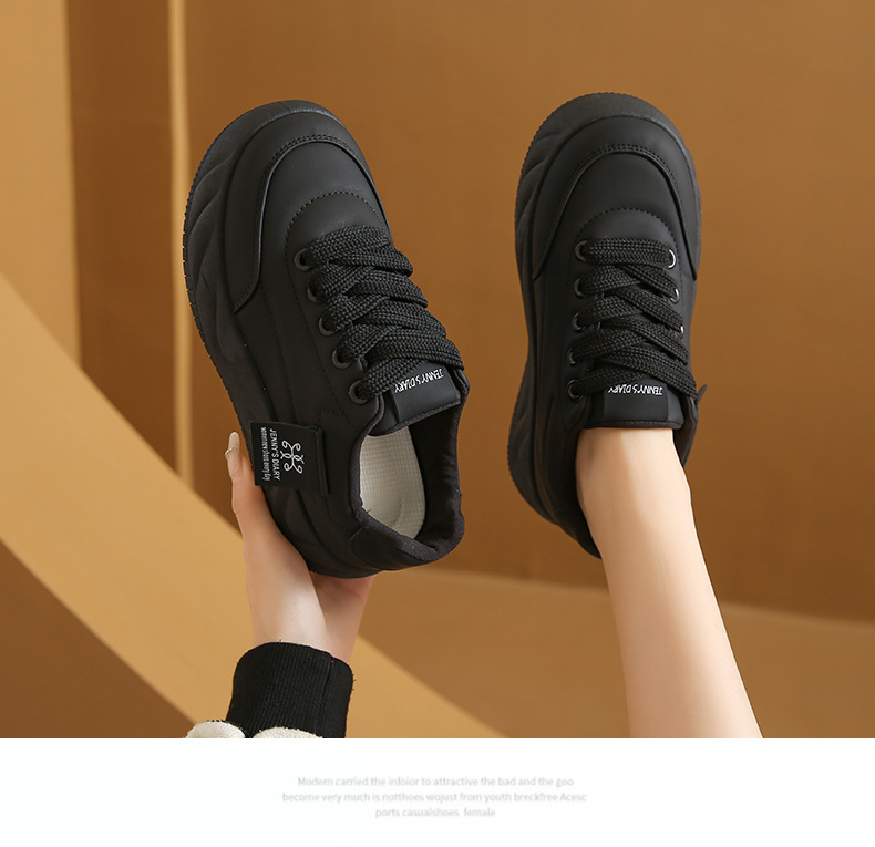 Side view of color block sneakers showing lace-up detail and low wedge height-increasing sole