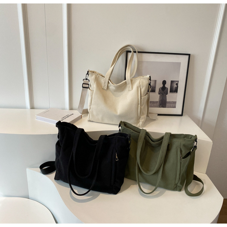 Large Capacity Art Student Shoulder Bag. Product information: Lining texture: Polyester, Applicable scenario: leisure travel, Color: creamy-white, green, black, Outer bag type: Sandwich pocket, Hardness: medium and soft, Material: corduroy, Suitcase shape