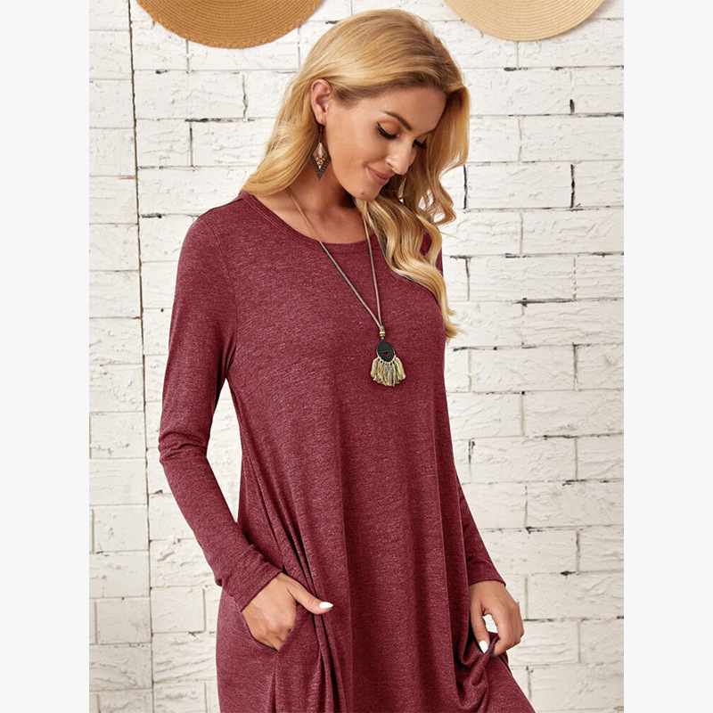 Women's long sleeve maxi dress in dark gray, side view showing A-line silhouette