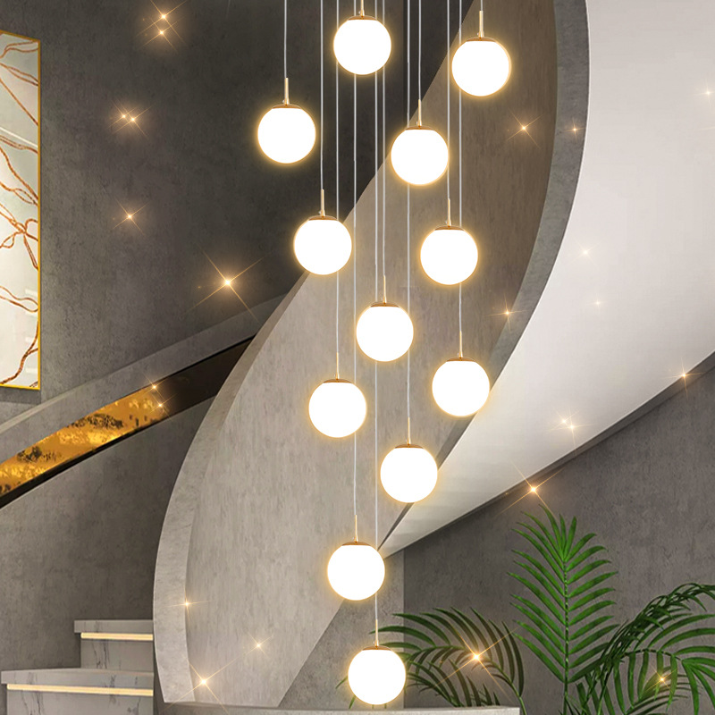Long Chandelier In The Spiral Staircase Hall