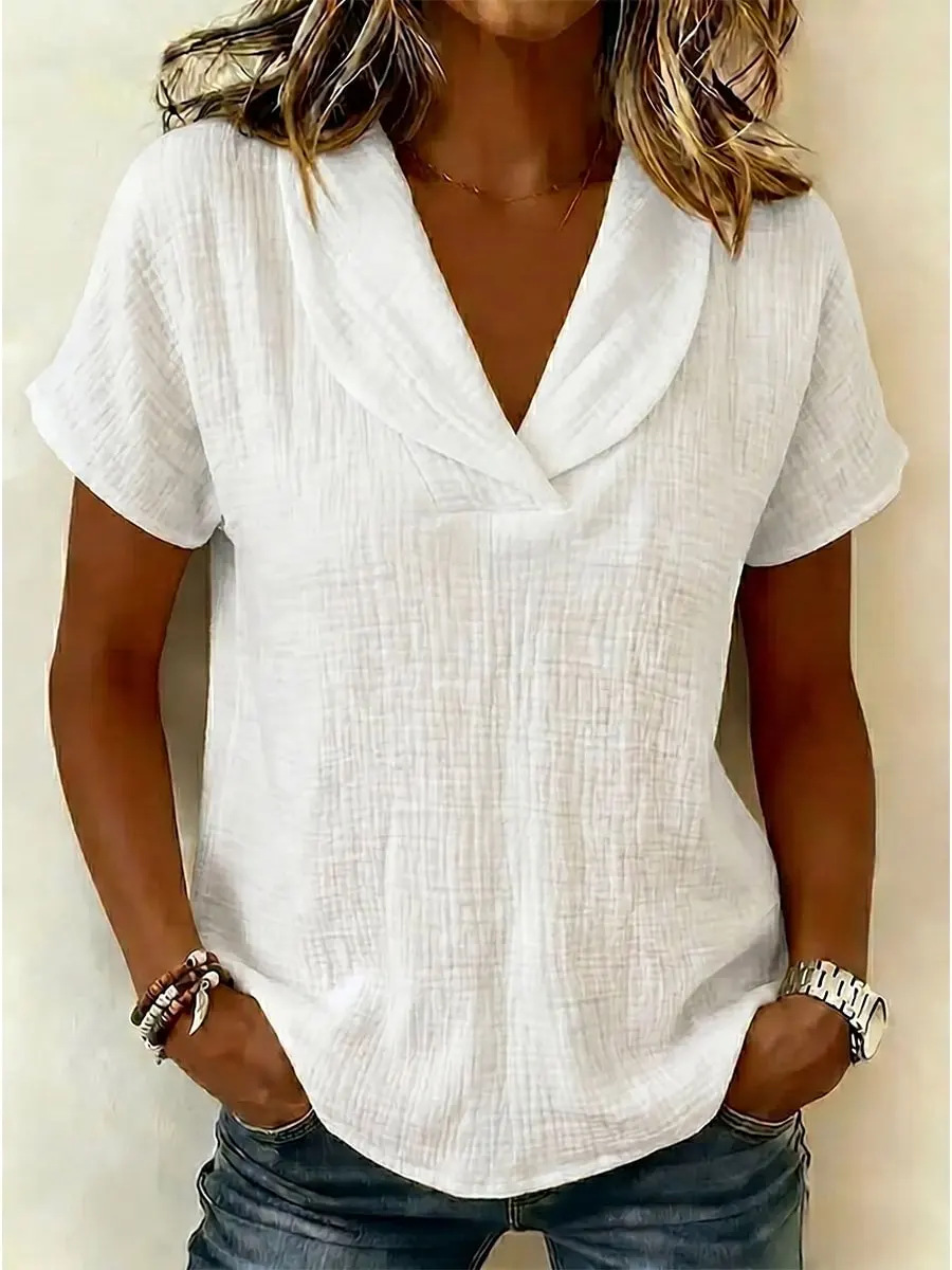 Women's knitted short-sleeve butterfly collar top, front view showing collar detail and silhouette