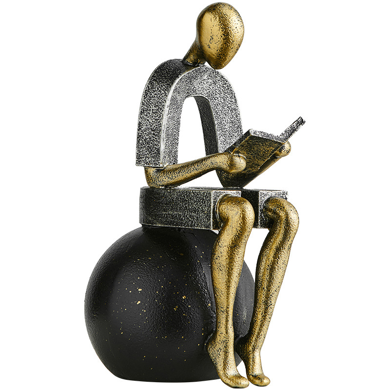 Abstract Resin Desk Ornament Of A Figure Reading And Pondering