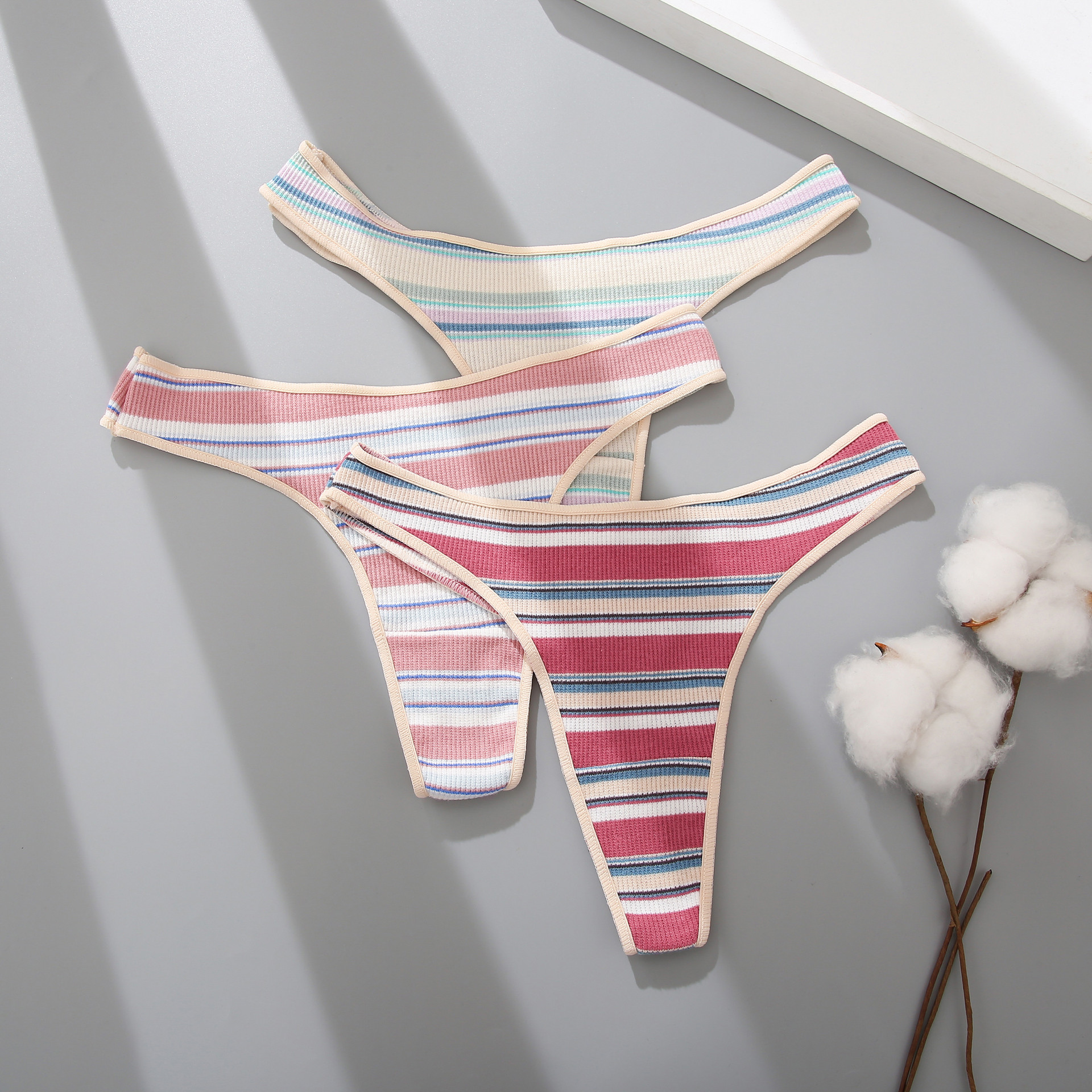 Title 2, Ladies thong panties with striped stitching, ne...