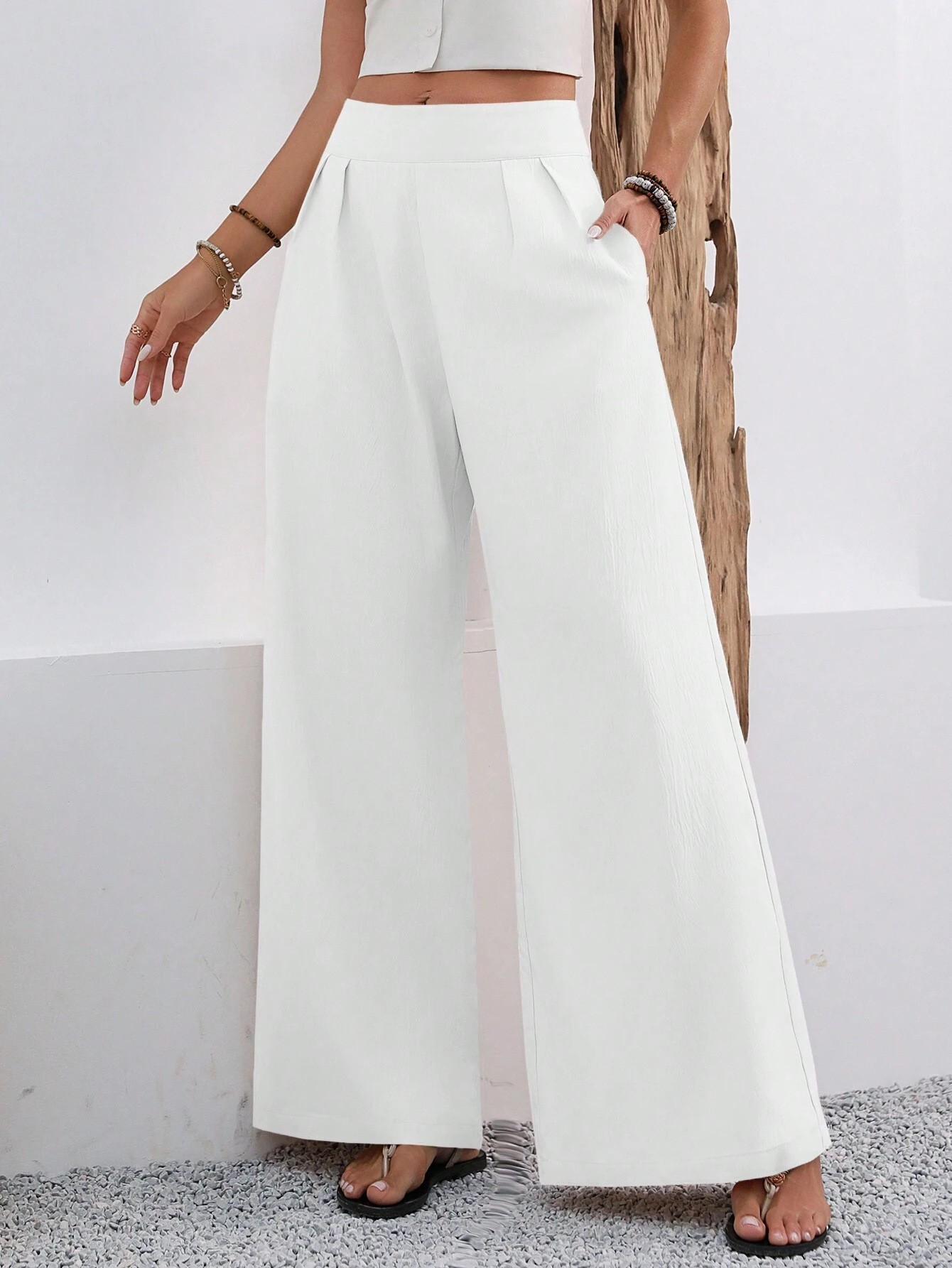 Women's wide-leg trousers in dark blue – full outfit