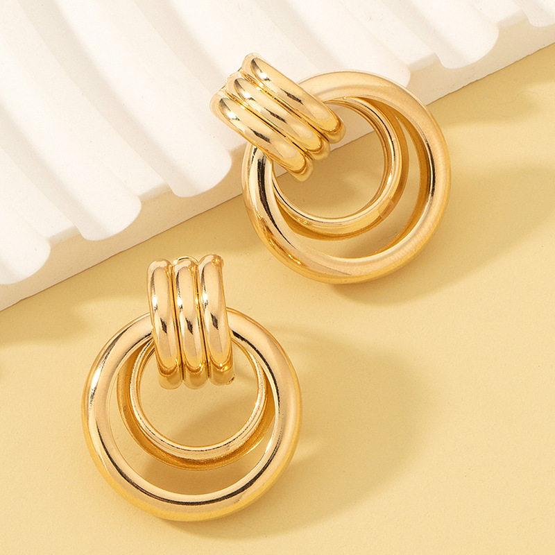 Double Round Ring Twin Twisted Ear Clip
