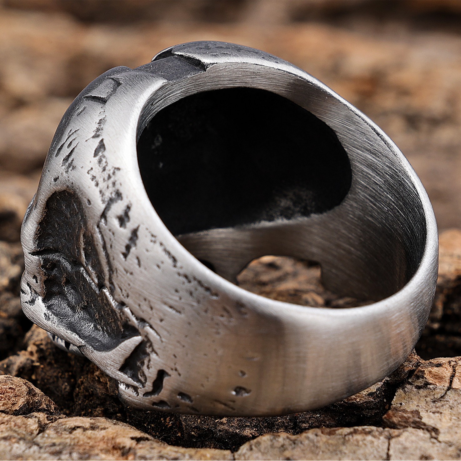 Bague rétro triple crâne en acier